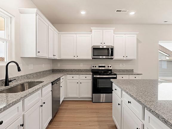 This kitchen has wood cabinetry