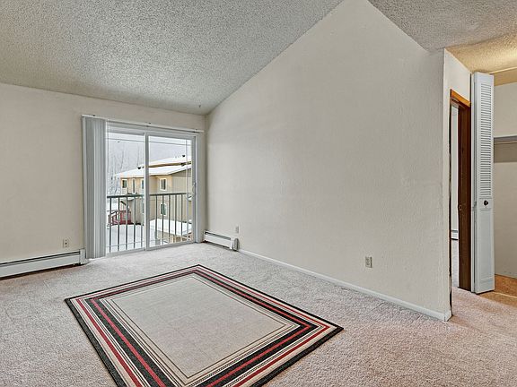 Conifer Grove Apartments - Living Room