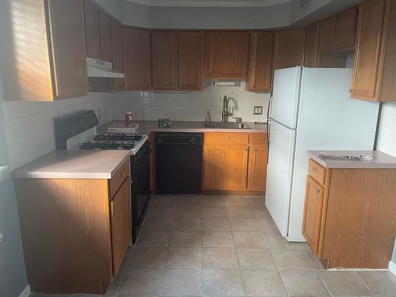 Kitchen with countertop microwave