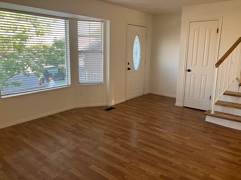Front door, coat closet