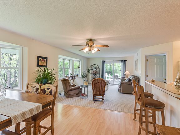 View upon entry from the foyer of the light and bright open floor plan.