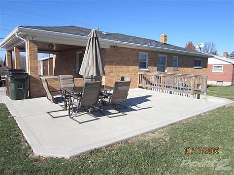 New, large, poured concrete patio.  Offers plenty of room for outdoor entertainment/enjoyment.