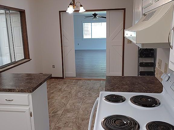 Kitchen/Barn Doors to Fam Rm