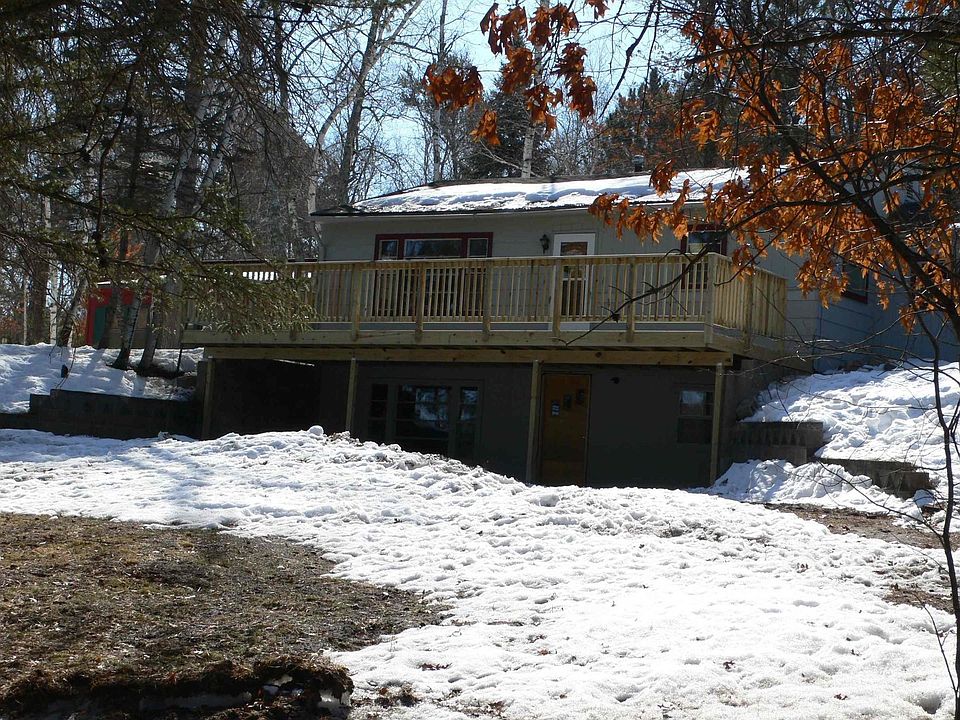 New deck overlooking the gentle slope to lake