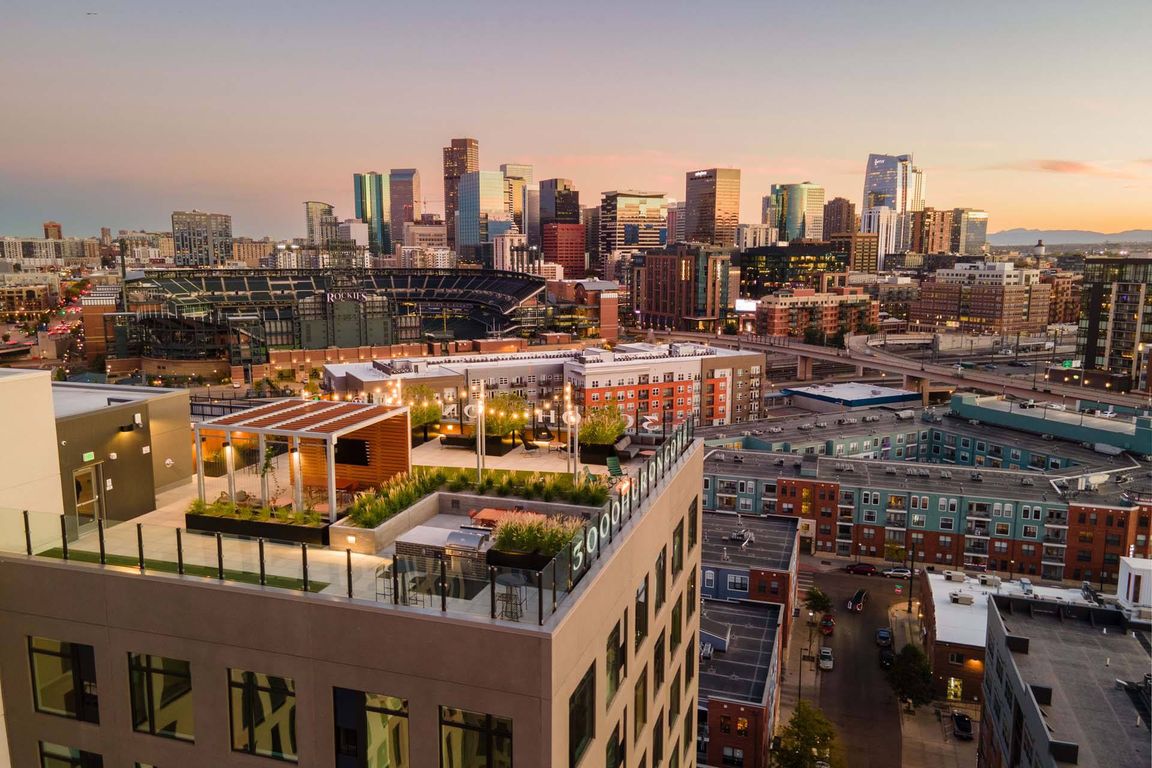 Enjoy stunning rooftop views with a vibrant cityscape backdrop.