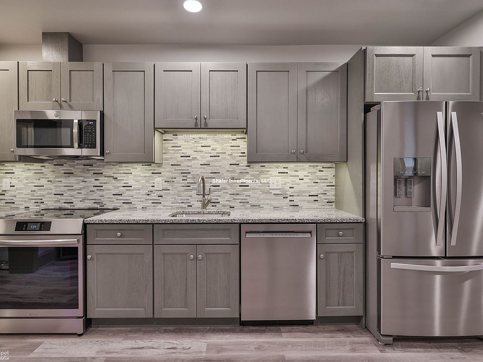 View of the kitchen featuring the cooking area