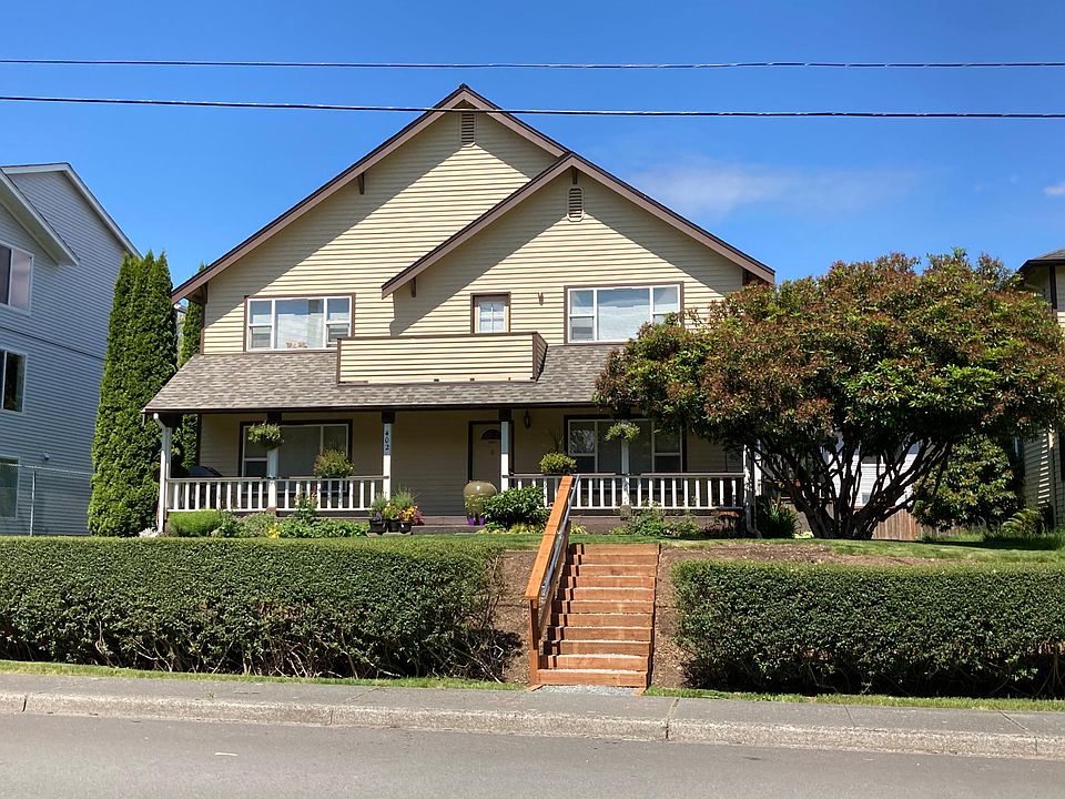 Exterior - faces First Street. Available unit is the entire lower floor with large front porch and access to front yard.