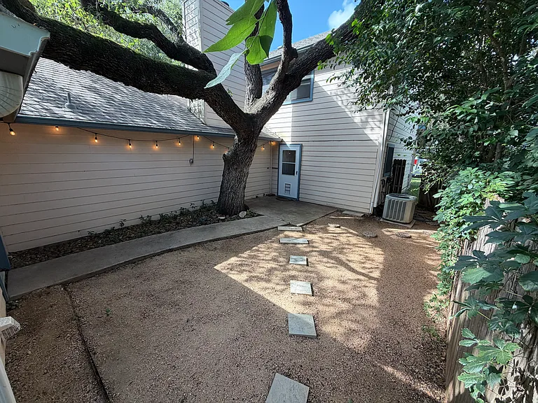 Shaded backyard under Grand Oak