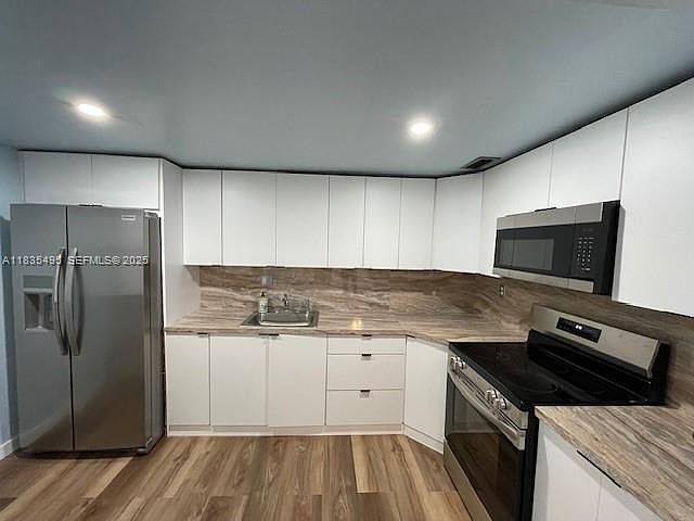 1st image of 1475 NE 125th Ter APT 614K