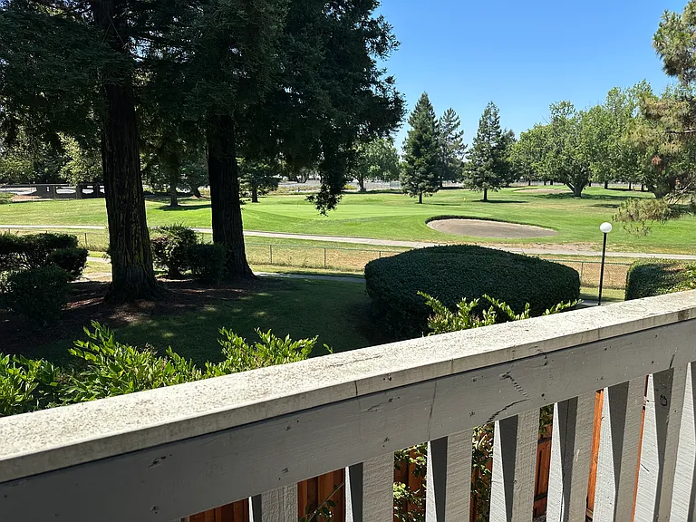 View of golf course from bedroom deck