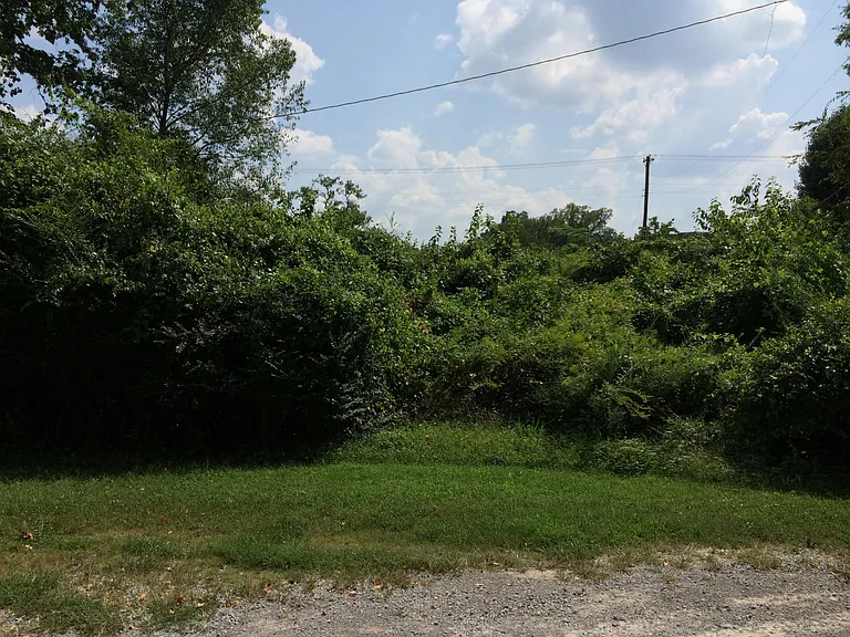 Lot behind rear parking