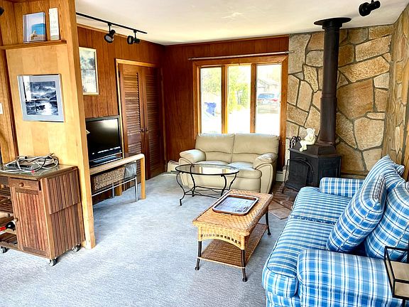 Living room area with wood stove.