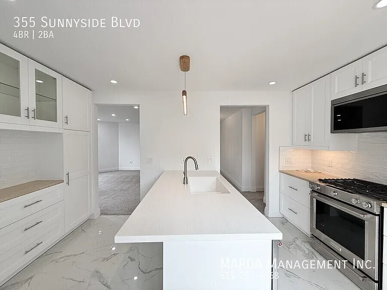 355 Sunnyside Blvd — Photo 11