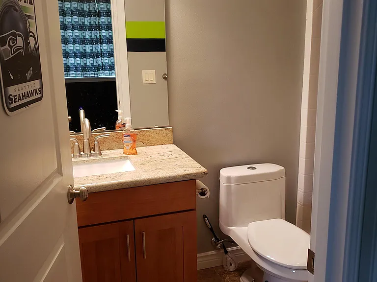 Downstairs bathroom near movie room