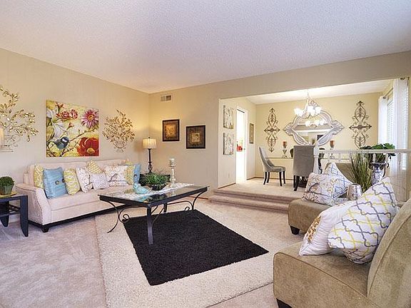 This is an Old Pic. Living room has brand new flooring & paint