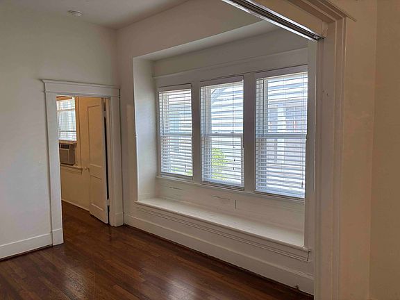 View of second room which can serve as a second living area, office or large dining room.