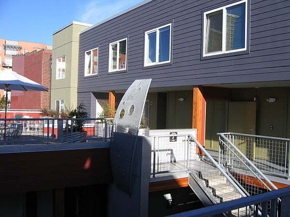 Deck area on 7th floor, with stairs, elevator is behind