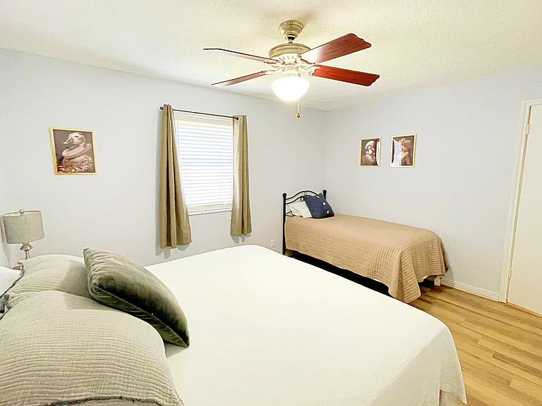 Master bedroom with king bed and twin bed