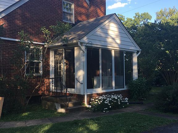 Side of house and 3 season porch
