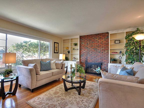 Elegant Living Room with Brick Fireplace