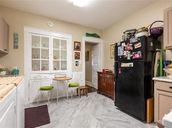 Kitchen with built-in storage hutch.