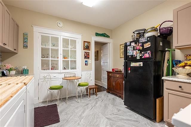 Kitchen with built-in storage hutch.