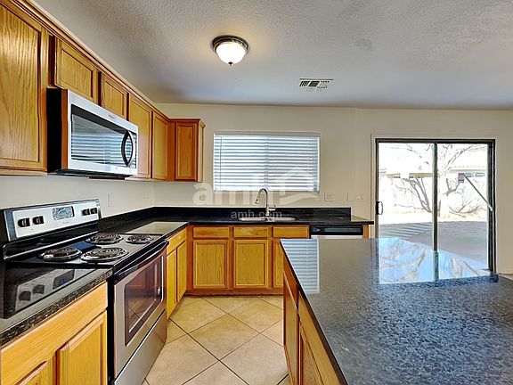 5th image of 8850 E Posada Ave