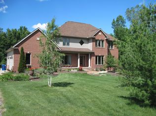 9784 Huron Creek Dr, Dexter, MI