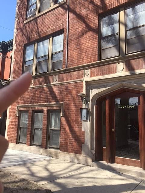 Outside the Building - My finger points to the apt