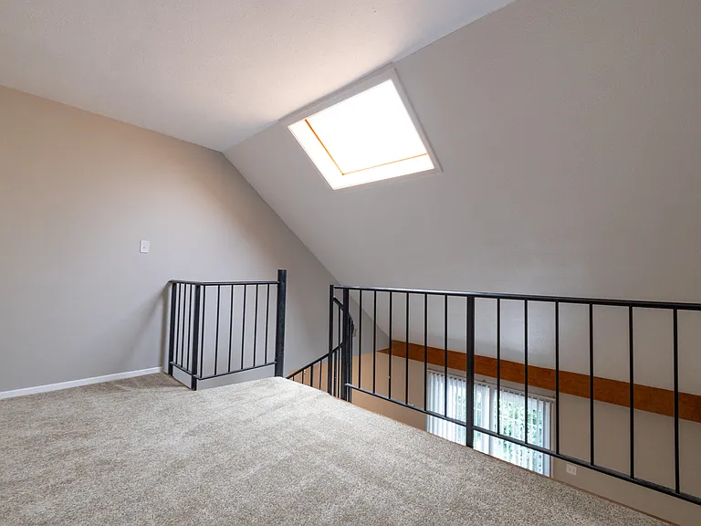 Loft space in the One Bedroom with Loft Apartment at Woodbridge Bloomington