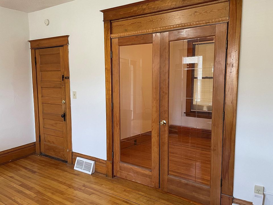 Living room dimensions 13x15. French doors open onto home office space (dimensions 10x8)