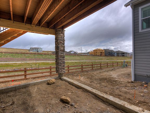 Covered Patio off Basement Backing to Open Space