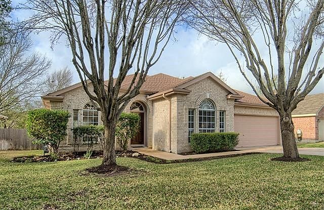This charming 4BR home sits on a peaceful lot that backs to greenbelt.