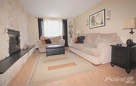 The Living Room Is Spacious And Bright