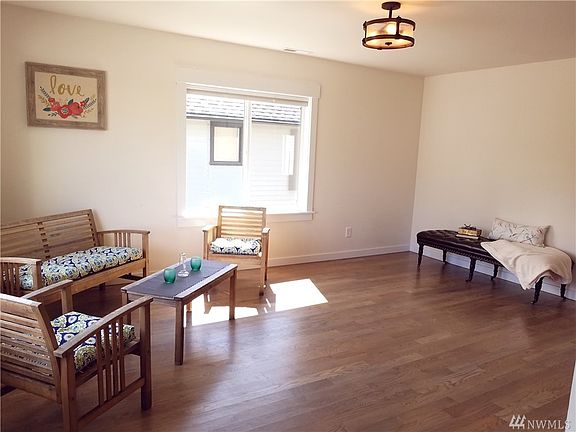Large living room with lots of natural light