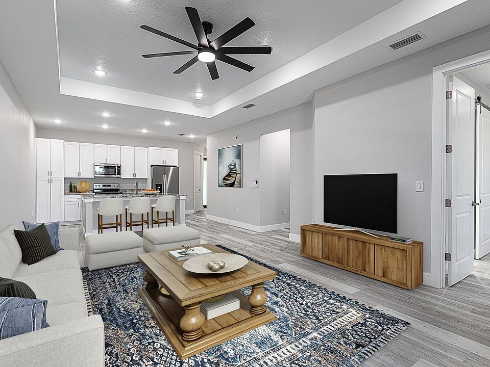 Beautiful open concept living space allowing creative decorating options