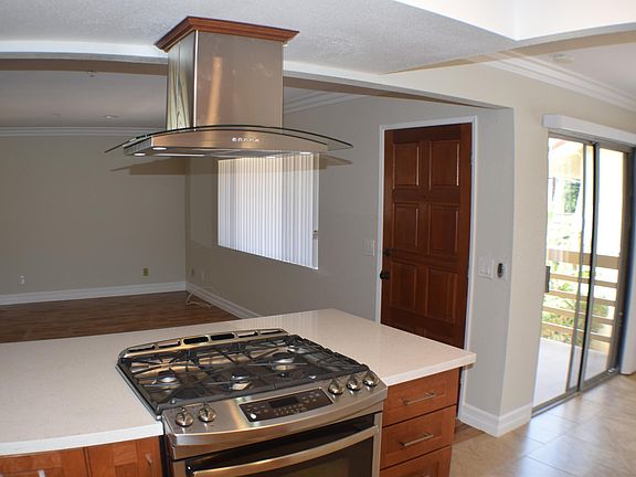 Kitchen looking between living and dining room