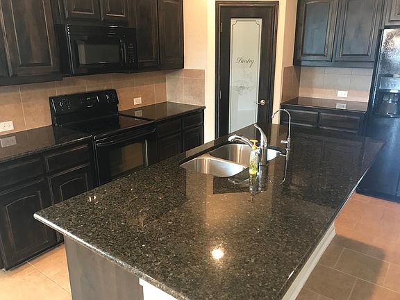 4th image of 1056 Meadow Scape Dr