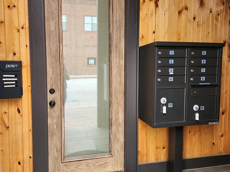 Apartment Entrance In Protected Cove on Sage Street. Note Secure Mailbox.