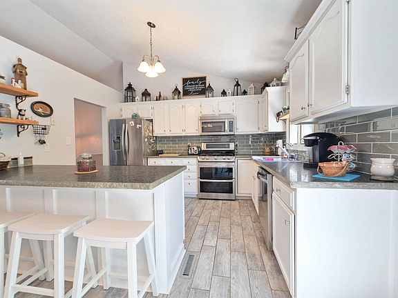 3rd image of 18552 Whispering Woods Dr Lot 31