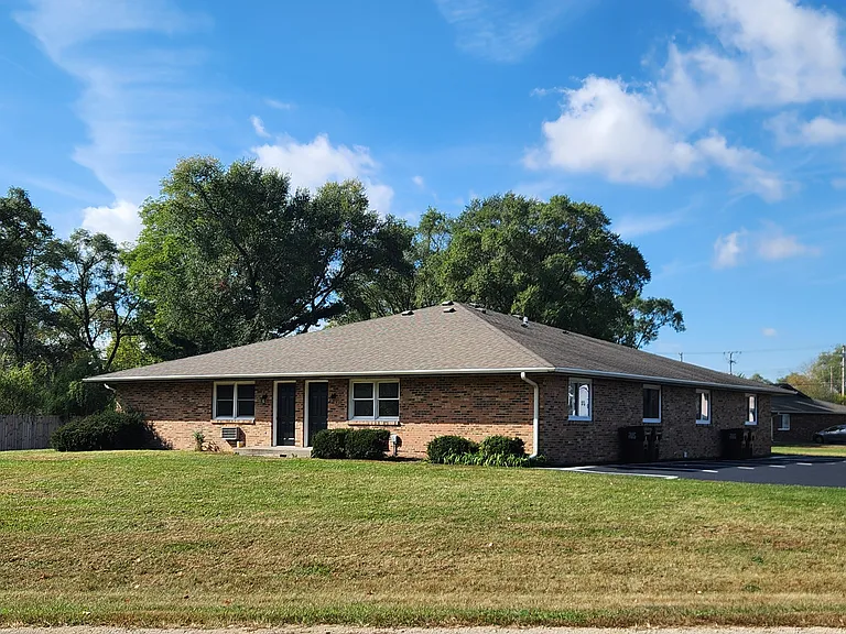 Located in Hononegah School District. 
This all Brick 4 family has full basement under each apartment for laundry hookup & storage.