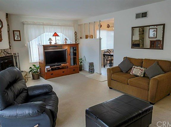 A more formal dining could be set up where there is currently entertainment center.