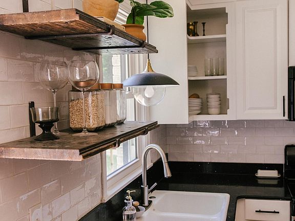 reclaimed shelves with custom subway tile & hanging light