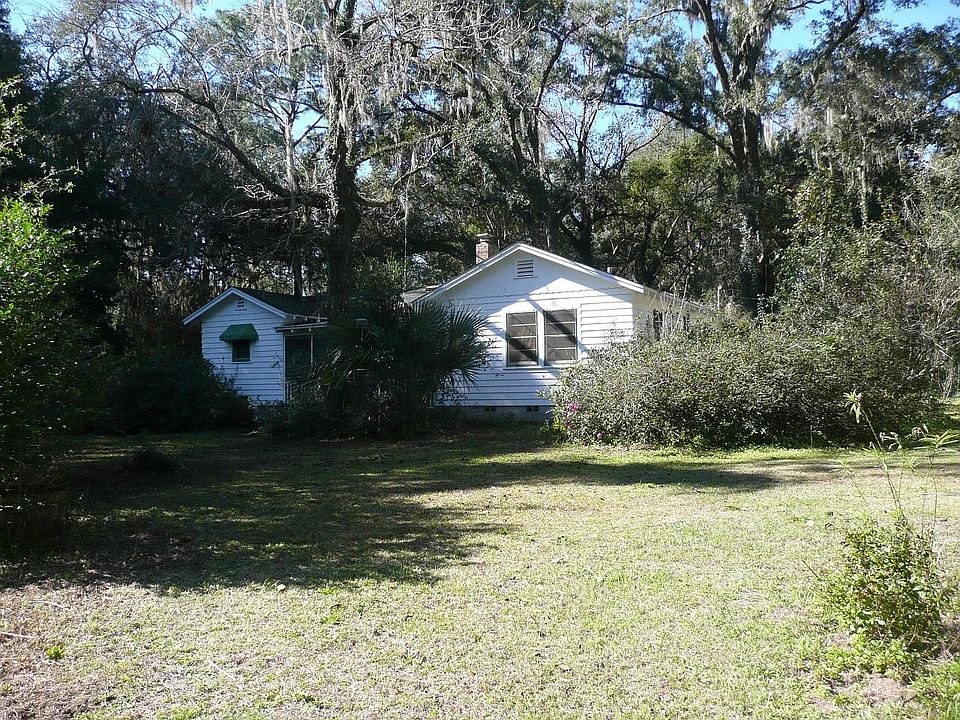 Back of house has open area for organic veggie garden