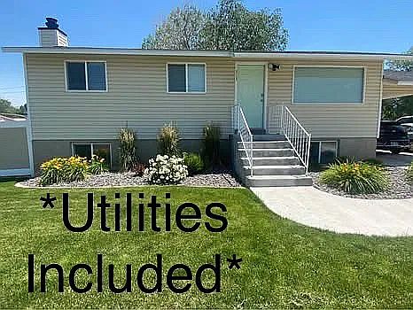 Basement apartment access is from the carport and down a full flight of stairs. Carport is used by tenants on mainfloor. Parking for basement tenants is south of carport, on gravel, and is not covered.