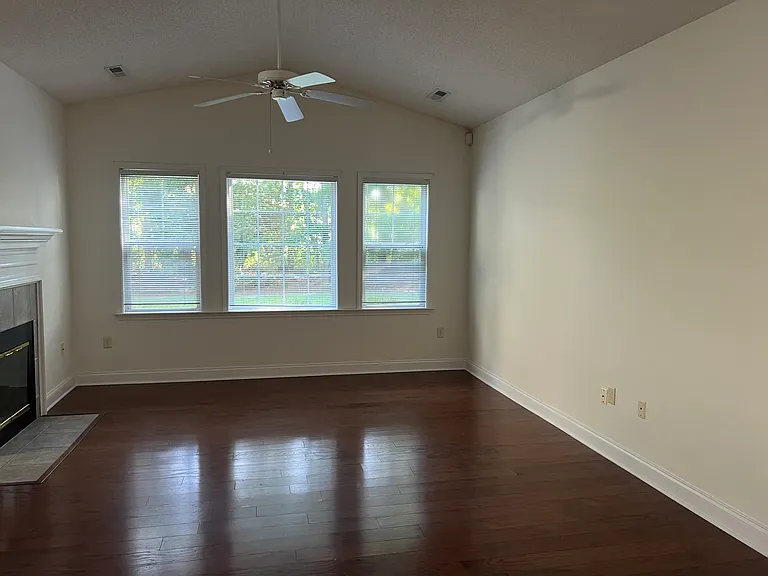 Main open spacious living area with fireplace