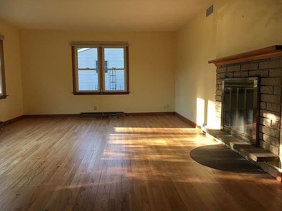 Living Room with Hard Wood & Fireplace