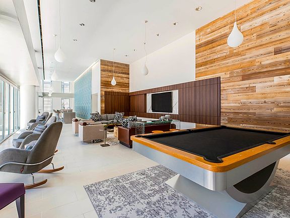 Play and relax in the modern resident lounge.