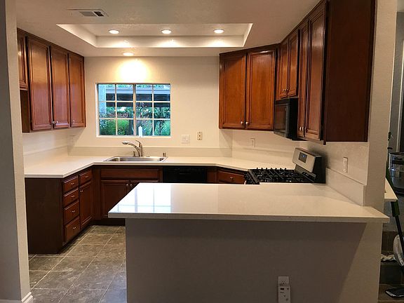 Remodeled Kitchen with Granite Counter and Breakfast Nook