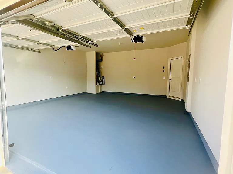 Epoxy painted Double car garage with multi light soft close garage openers + remote